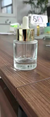 Vial moldeado de vidrio de 135 g para paquete de cuentagotas