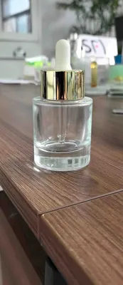 Vial moldeado de vidrio de 135 g para paquete de cuentagotas