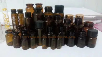 Roll-on 5 ml mini botella de vidrio ámbar para un paquete cosmético