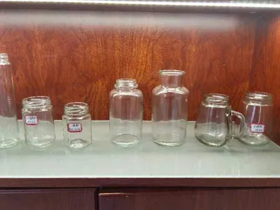 Botella de vidrio transparente moldeado en boca ancho 80 g/135g/250g/350g/500g/700g