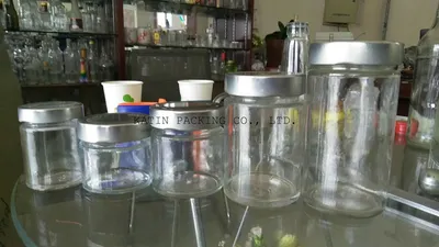 Jarra de vidrio de botella redonda empacar alimentos escaneados