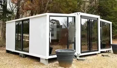 Instalar rápida Prefabricante Modular portátil plegable Packing plano de 2 dormitorios Casa de recipiente expandible con baño
