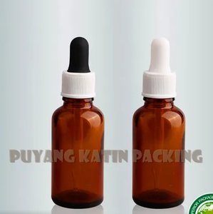 Botella de vidrio tubular ámbar para paquete cosmético